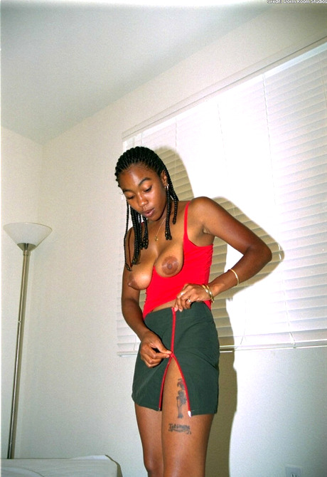 Michelle takes of her dress and red panties showing pink pussy - 8 of 16