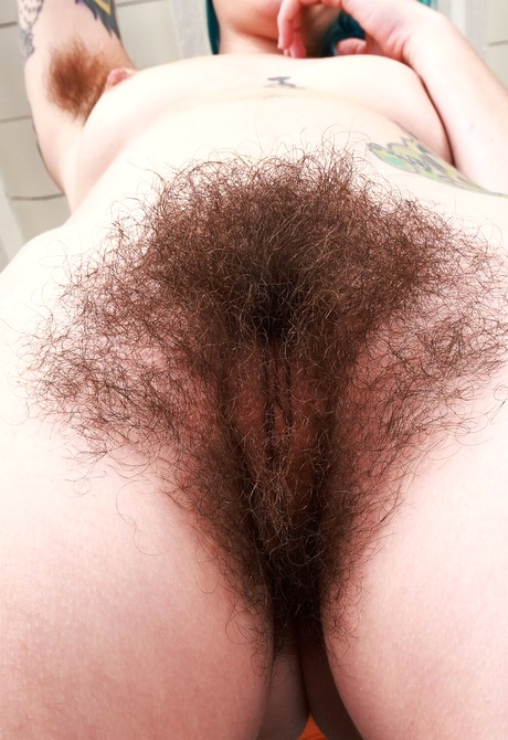 Blue haired natural Pearl Sage showing thick hairy snatch in lingerie