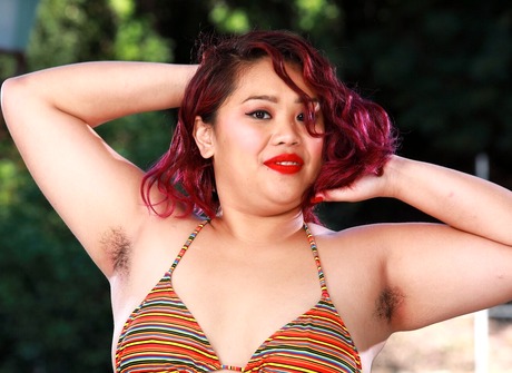 Chubby redhead Manila Bey spreads hairy pussy while on her back - 3 of 16