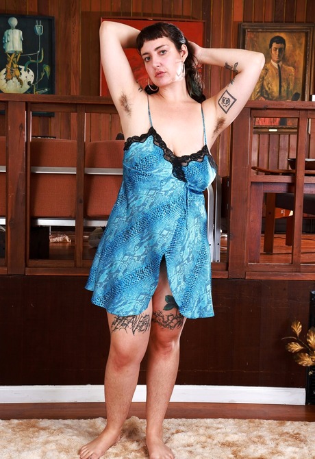 Autumn Berlin showcases her hairy legs pussy and saggy big tits