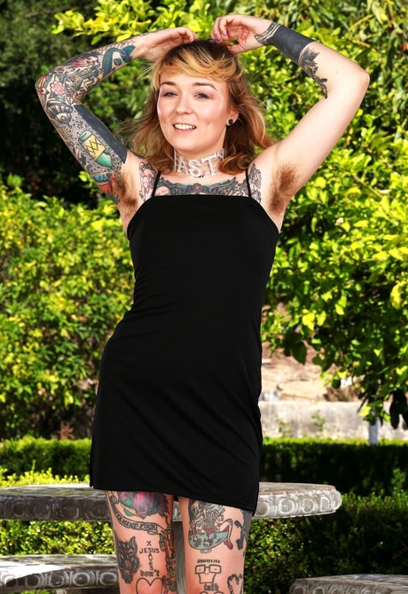 Tattooed petite amateur Felicia Fisher peeling off panties to share muff - 2 of 16