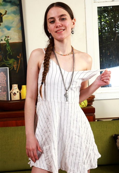 Sia Wood reveals small tits and hairy pussy during phenomenal stripping